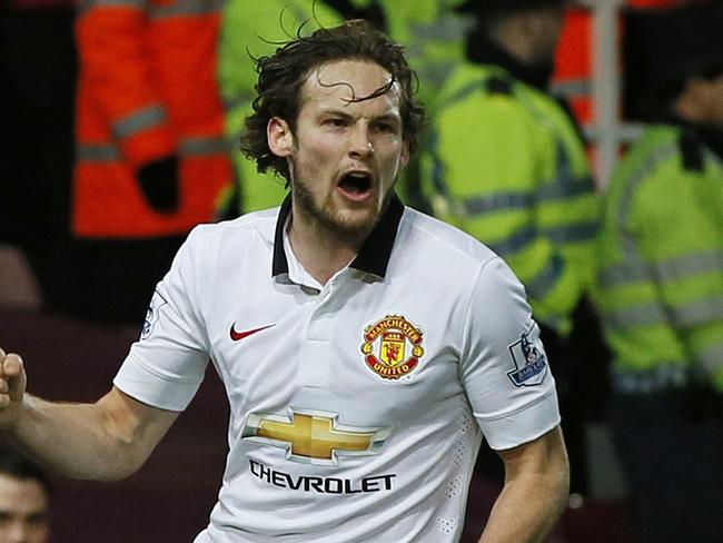 Manchester United’s Daley Blind celebrates after scoring during the English Premier League soccer match between West Ham United and Manchester United at the Boleyn Ground in London, Sunday, Feb. 8, 2015. (AP Photo/Alastair Grant)