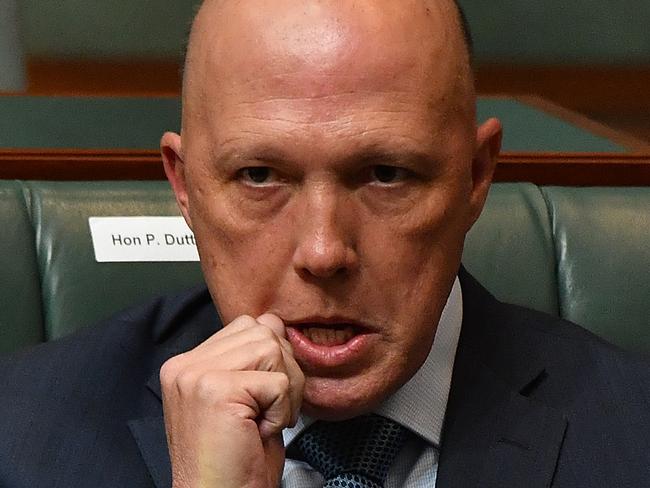 CANBERRA, AUSTRALIA - NOVEMBER 12: Minister for Home Affairs Peter Dutton during Question Time in the House of Representatives at Parliament House on November 12, 2020 in Canberra, Australia.  The Coalition has relied on One Nation and Centre Alliance to pass its $4bn recession-busting wage subsidy JobMaker for young workers fracturing with Labor over a COVID-19 emergency relief measure. JobMaker is estimated to create 450,000 jobs, with Labor insisting on a job security amendment that would prevent employers sacking existing workers in order to qualify for the scheme. (Photo by Sam Mooy/Getty Images)