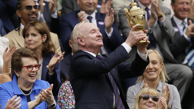 Rod Laver — with Billie Jean King sitting behind him and Martina Navratilova, right — is feted at Wimbledon. Picture: AP