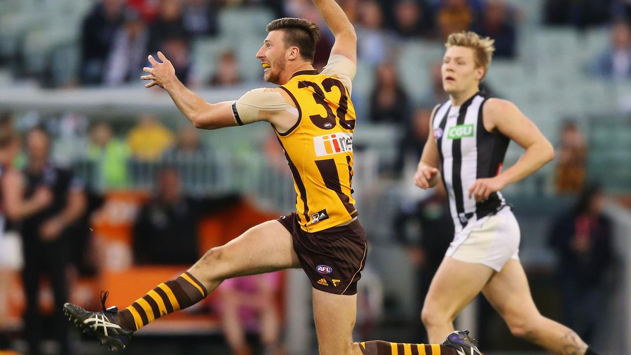 Hawthorn’s Jack Fitzpatrick kicks his iconic matchwinning goal against Collingwood in 2016. Picture: Michael Dodge/Getty Images