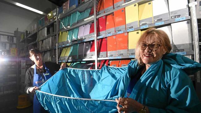 Ballina spotlight departement team leader Karen Burke and store manager Sheree Albert struggle with a fitted sheet before the Home Sweet Home expo. Photo Marc Stapelberg / The Northern Star. Picture: Marc Stapelberg