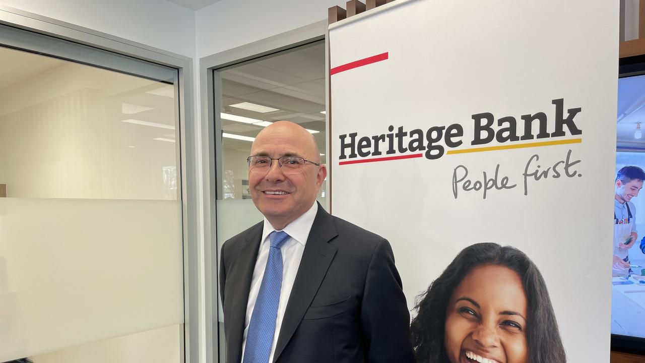 Heritage Bank CEO Peter Lock will lead the merged group for 18 months and then step down.