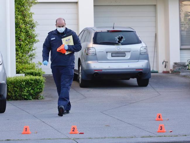 Several shots were fired at the home and a car. Picture: Hamish Blair