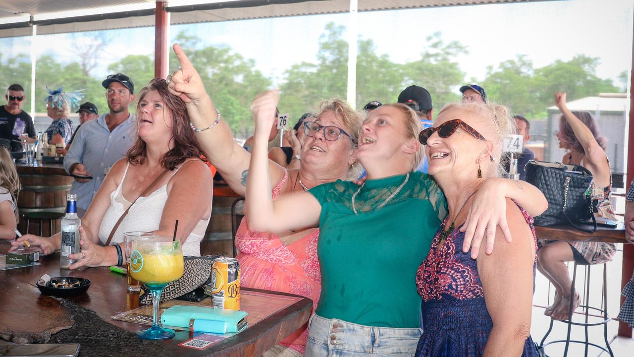 From L Credwyn Dearly, Lee Burgess, Caitlyn Newton and Kaz Langdgebe watching the cup at Berry Springs Croc Races celebrating the Melbourne Cup Picture: Glenn Campbell