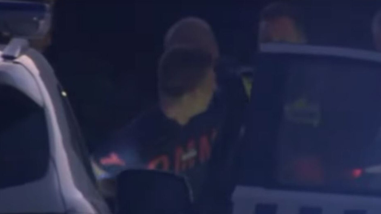 Scott Quilliam being arrested by police. Source: Channel 7