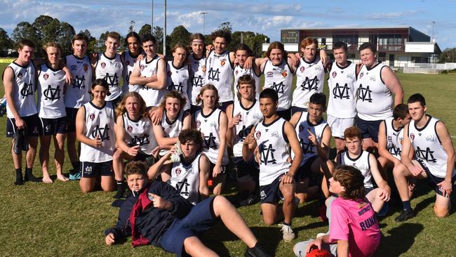 Mountain Creek State High's senior boys team celebrates winning the Sunshine Coast round of the AFLQ Secondary Schools Cup.