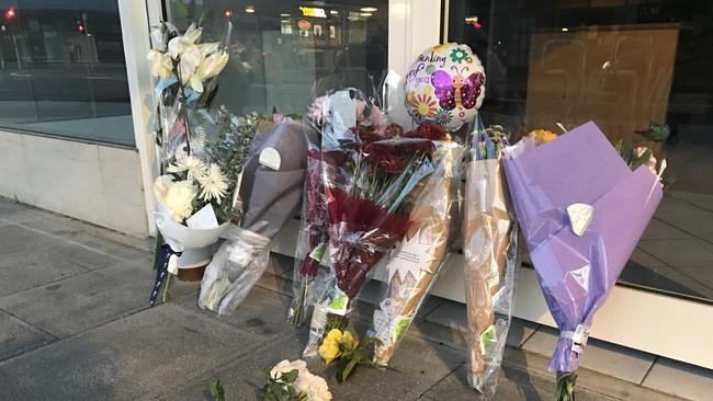 Flowers left at the scene where Rex Court died. Picture: Simon Cross