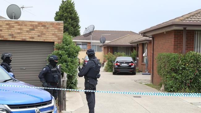 Police outside a property in Dallas. Picture: Alex Coppel.