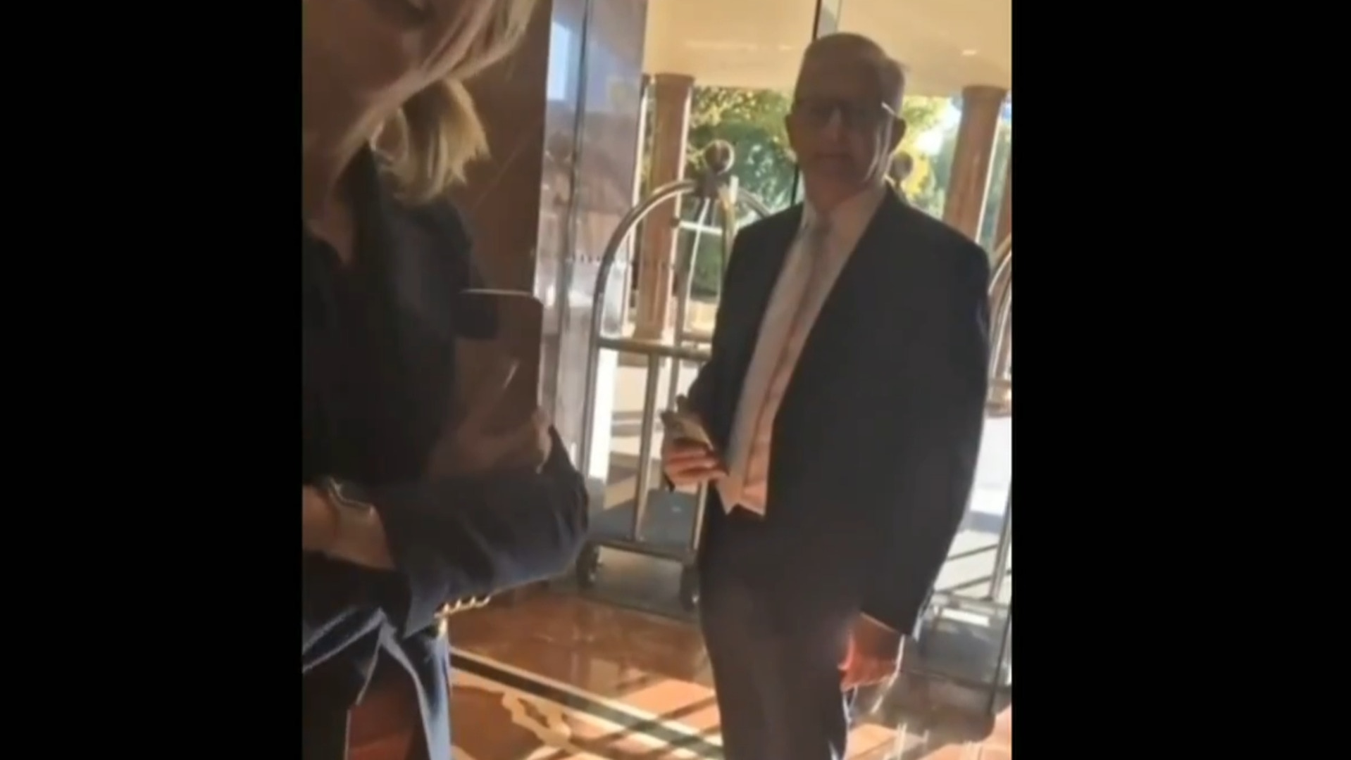 Prime Minister confronted in Melbourne hotel lobby