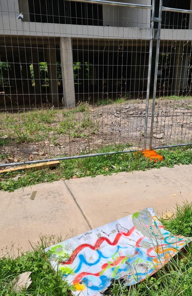 Graffitied debris sits out the front of the abandoned tower. Picture: Thomas Morgan