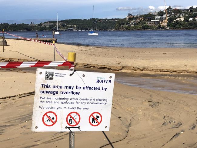 Northern Beaches Council has closed all beaches and warns people to stay out of the water due to stormwater and possible sewage contamination. A sign at Clontarf Reserve on Saturday morning.