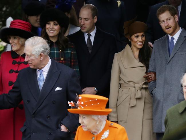 FILE - In this Monday, Dec. 25, 2017 file photo, front from left, Prince Charles, Queen Elizabeth II and Prince Philip. Rear From left, Camilla, Duchess of Cornwall, Kate, Duchess of Cambridge, Price William, Meghan Markle, and her fiancee Prince Harry, following the traditional Christmas Day church service, at St. Mary Magdalene Church in Sandringham, England. In a stunning declaration, Britain's Prince Harry and his wife, Meghan, said they are planning "to step back" as senior members of the royal family and "work to become financially independent." A statement issued by the couple Wednesday, Jan. 8, 2020 also said they intend to "balance" their time between the U.K. and North America. (AP Photo/Alastair Grant, file)