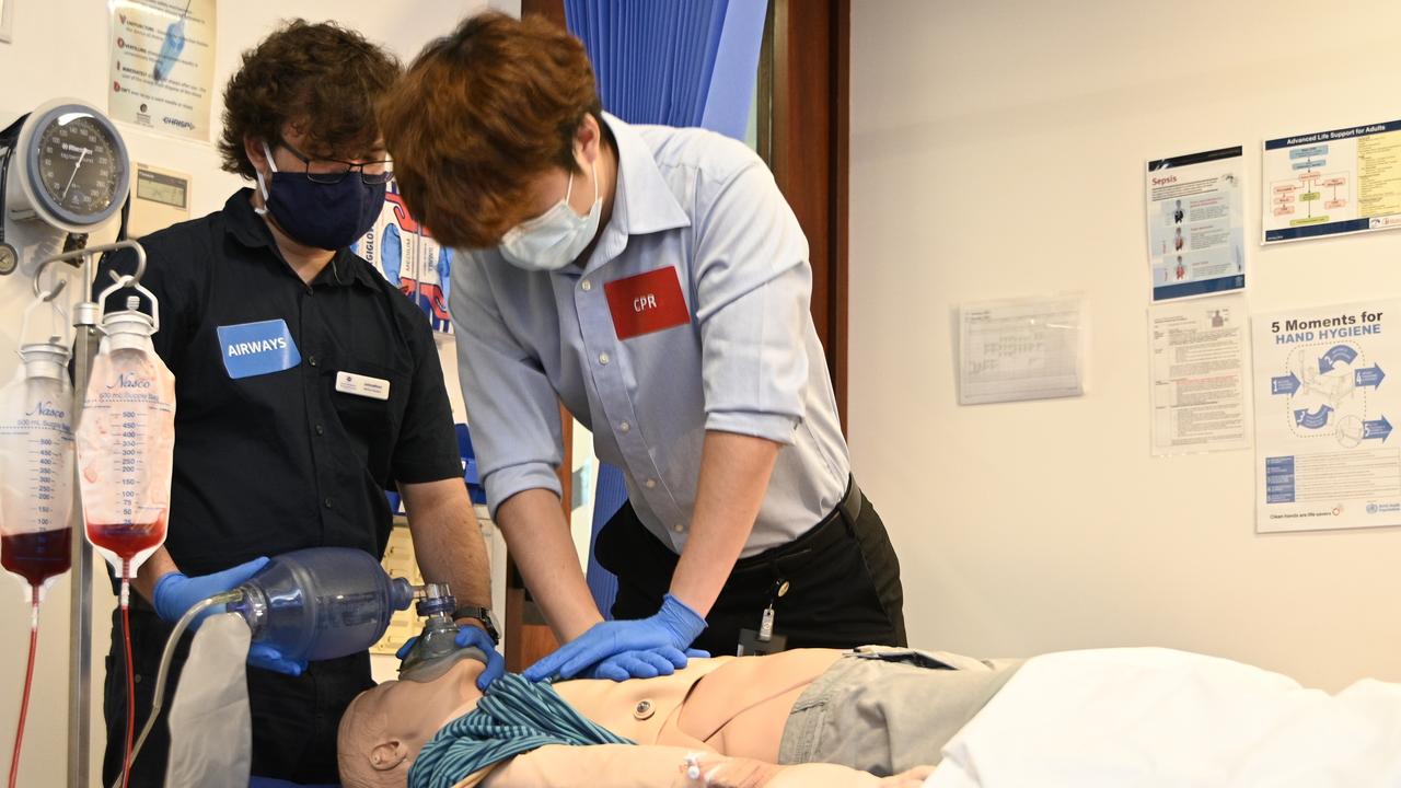 UQ medical students Johnathon Lejins and Brendon Song.