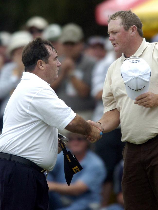 Craig Parry and Jarrod Lyle shake hands after the 18th hole during the 2005 Heineken Classic at Royal Melbourne.