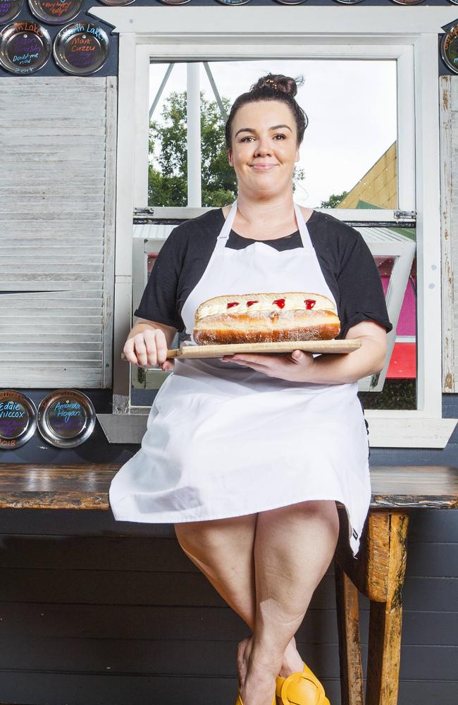 Kenilworth Country Bakery owner Jenna Sanders with one of its 1kg doughnuts. Picture: Lachie Millard