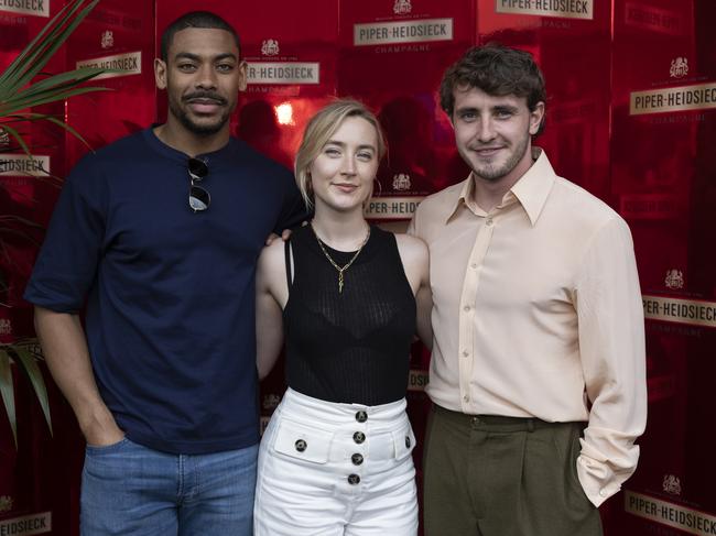 Aaron Pierre, Saoirse Ronan and Paul Mescal at the Australian Open in Melbourne. Picture: Fiona Hamilton/Tennis Australia