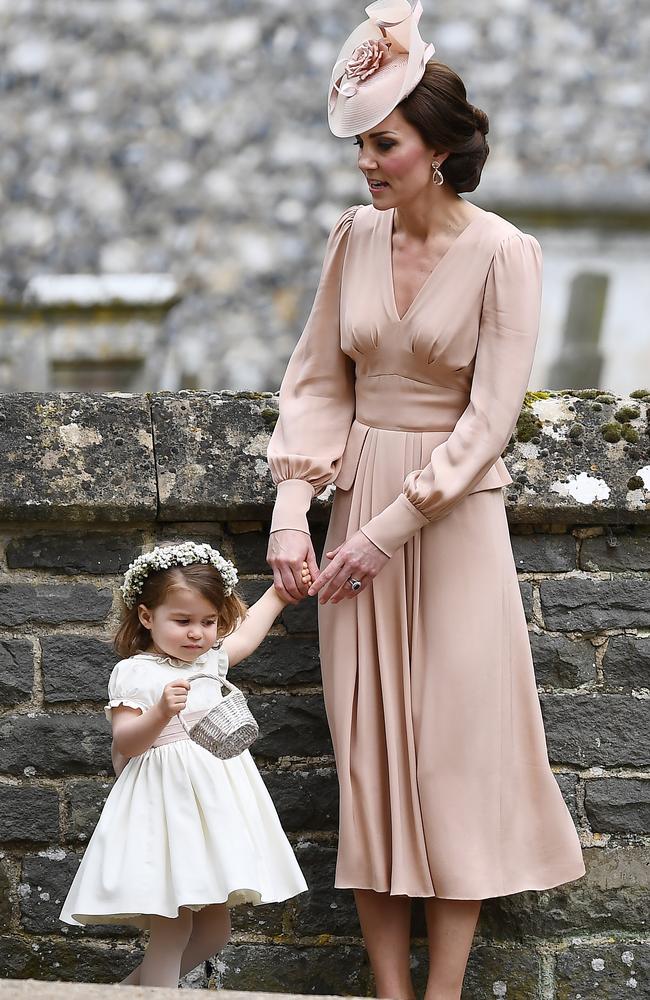 Princess Charlotte and Prince George could feature in the bridal party. Picture: AFP PHOTO/ Justin TALLIS