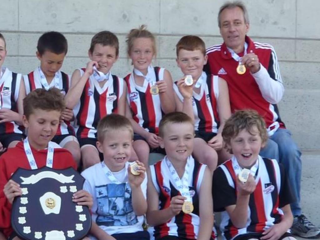 Gulden (back, second from left) celebrates a title win while at the Maroubra Saints. Picture: Supplied