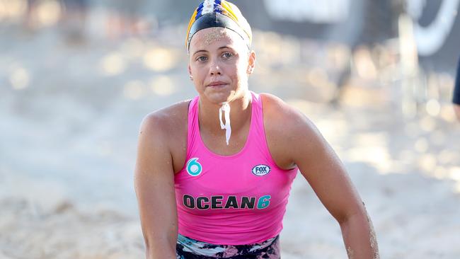 Kurrawa's Claudia Slaven just misses qualifying for the opening round of the Nutri-Grain Ironwoman Series at Queenscliff, NSW after falling in a sprint to the line during the heats repechage. Photo: Shane Myers