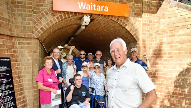 Campaigner Bill Aitken (front) and fellow commuters are excited that a lift will be installed at Waitara train station. Picture: Troy Snook