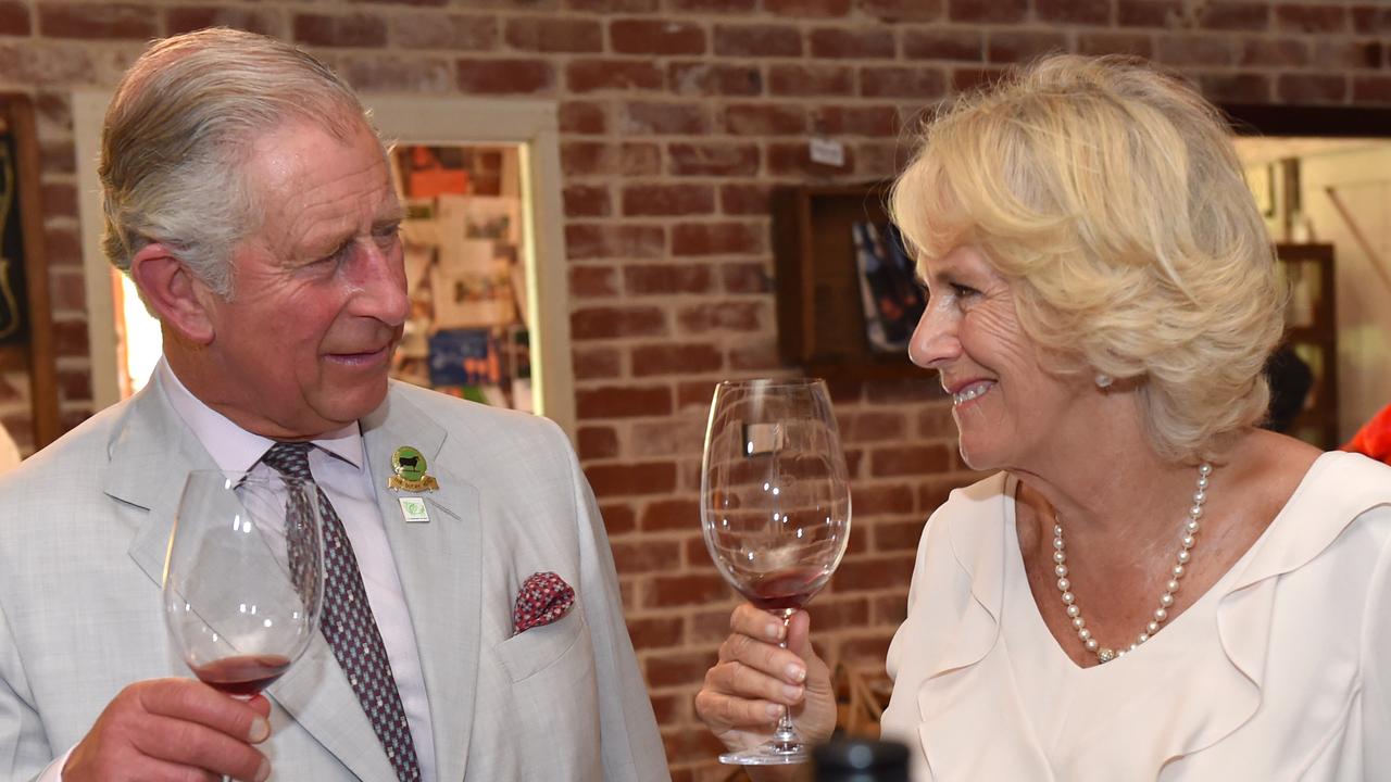 Charles and Camilla try local wines during a visit to Albany, WA in November 2015. Picture: AAP