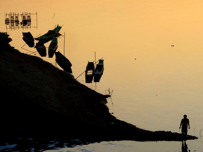 The sun sets on the Mekong River. Picture: Linda Silmalis