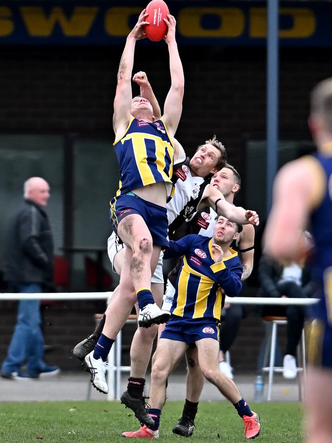 EDFL: Rupertswood’s Aaron West takes a good mark. Picture: Andy Brownbill