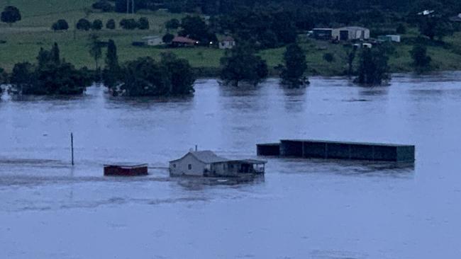 A house in West Taree was swept away in floodwaters on Saturday after heavy rain battered the area. Picture: Robert Cribb / Severe Weather Australia