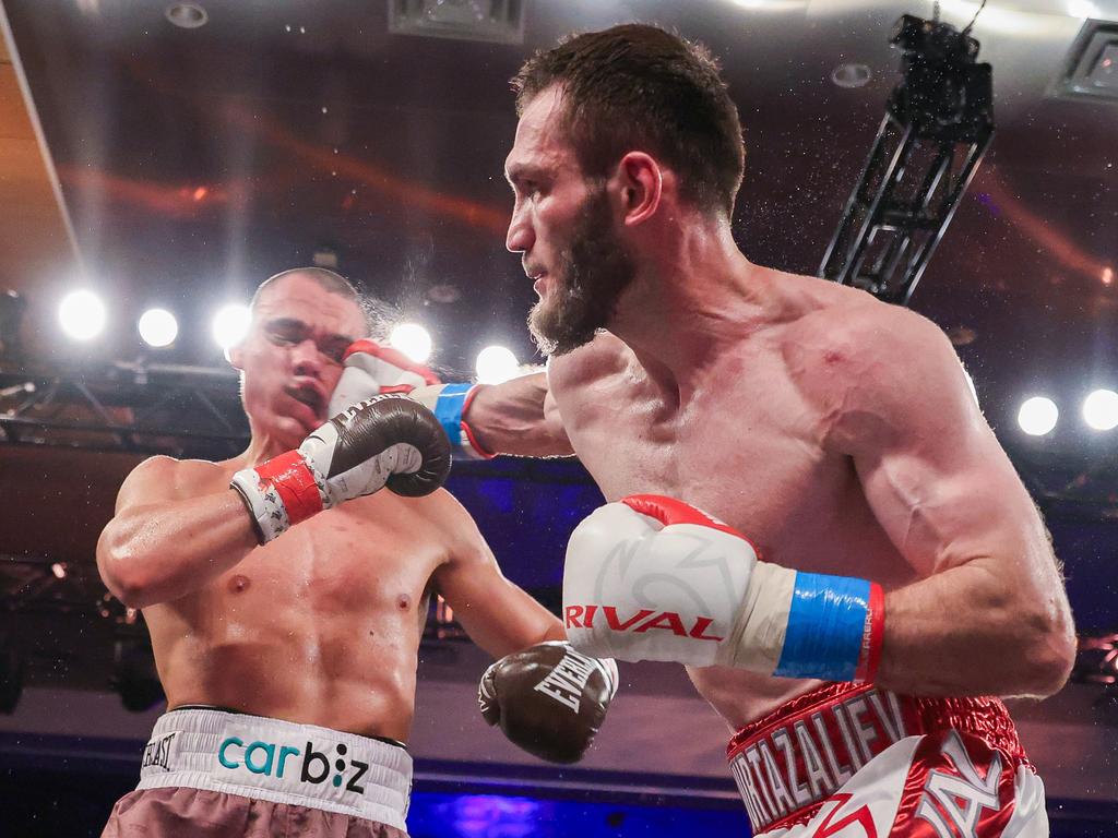 Tim Tszyu is punched by Bakhram Murtazaliev during his devastating third round knockout. Picture: Alex Menendez/Getty Images