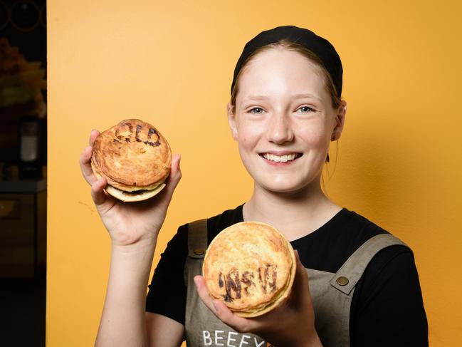 Newtown Beefy's staff member (and New South Wales supporter) Nina Bailey with Beefy's State of Origin pies, Sunday, May 25, 2025. Picture: Kevin Farmer