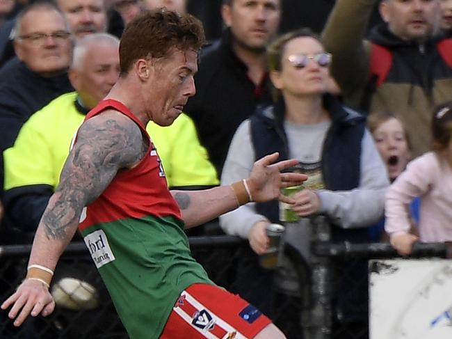 The Pines Aaron Ludewig kicks the winning point after the siren during the MPNFL Division 1 grand final between The Pines and Sorrentoin Frankston, Sunday, Sept. 16, 2018. Picture: Andy Brownbill)