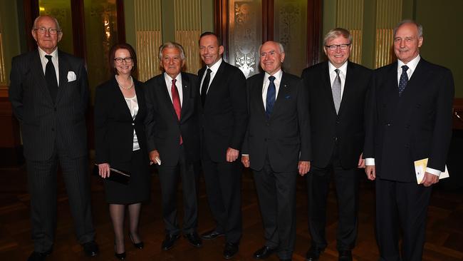 Former prime ministers of Australia (L-R), Malcolm Fraser, Julia Gillard, Bob Hawke, Tony Abbott, John Howard, Kevin Rudd and Paul Keating assemble for a photograh at the completion of the memorial service for Gough Whitlam in 2014.