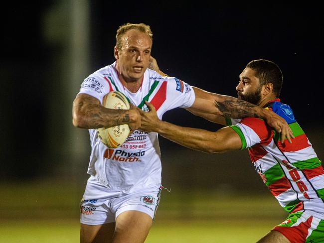 Nightcliff's Clint Chettle shows off his speed and power against South Darwin. Picture: Che Chorley