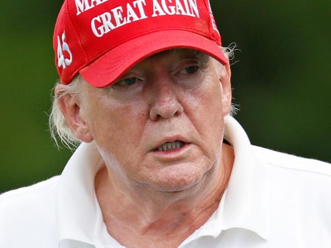 *** BESTPIX *** BEDMINSTER, NEW JERSEY - JULY 28: Former U.S. President Donald Trump reacts after his shot from the second tee during the pro-am prior to the LIV Golf Invitational - Bedminster at Trump National Golf Club Bedminster on July 28, 2022 in Bedminster, New Jersey. (Photo by Cliff Hawkins/Getty Images)