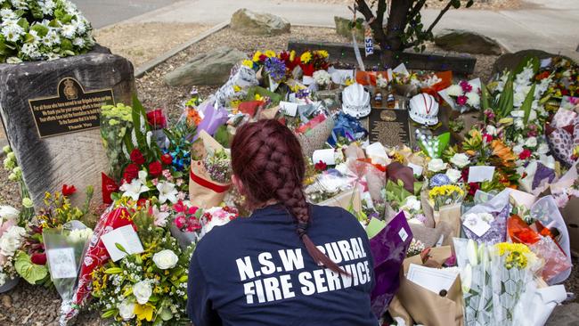 Tributes for volunteers Geoffrey Keaton and Andrew O'Dwyer are seen at Horsley Park Rural Fire Brigade on December 22, 2019. Picture: Jenny Evans/Getty Images