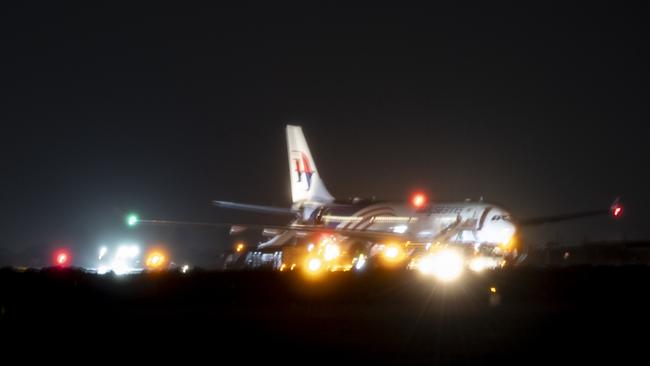 Passengers were finally allowed to disembark after about three hours on the ground at Sydney airport. Picture: NCA NewsWIRE/ Monique Harmer