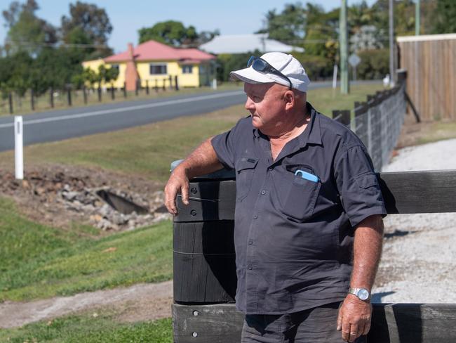 Bruce Green looks out with his brother Warren's house in the background at Palmers Channel. Bruce said Warren is on the mend after suffering a stroke while walking to do his daily shopping - for which many in the Clarence know him for.