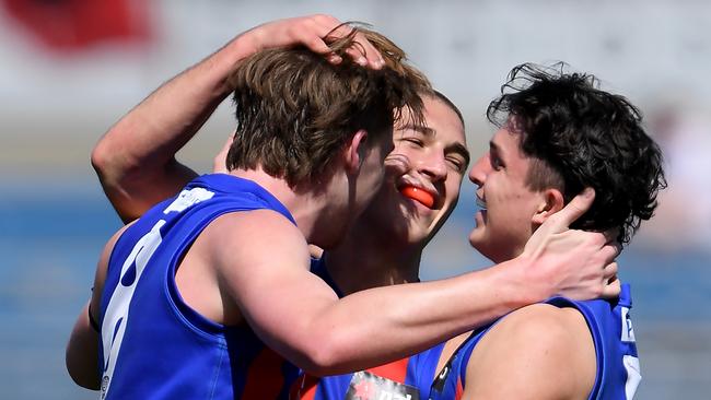 The Oakleigh Chargers celebrate a finals victory last year.