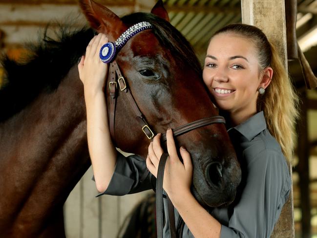 Harness racing trainer driver Brittany Graham with Chippie. Pic Mark Calleja