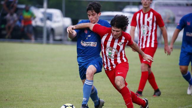 Stratford's Quinn Wales and Innisfail's Jacob Vecchio battle it out in the FFA Cup football match between the Stratford Dolphins and the Innisfail Cutters, held at Walker Road sporting precinct, Edmonton. Picture: Brendan Radke