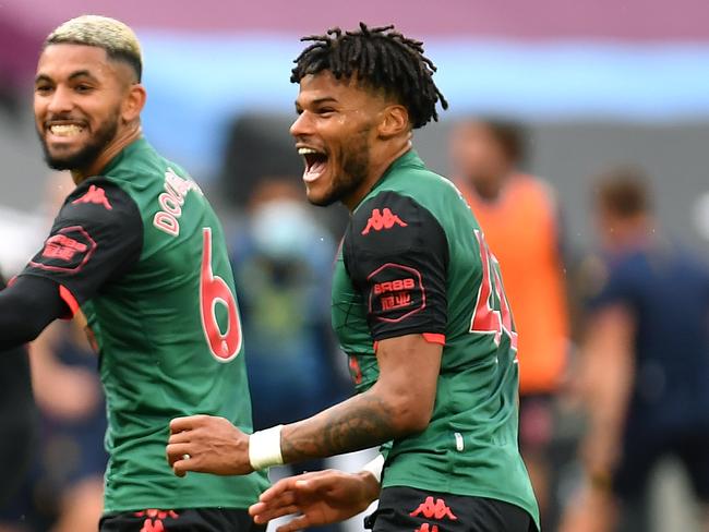 LONDON, ENGLAND - JULY 26: Jack Grealish of Aston Villa celebrates after scoring the first goal with team mates Tyrone Mings of Aston Villa and Douglas Luiz of Aston Villa during the Premier League match between West Ham United and Aston Villa at London Stadium on July 26, 2020 in London, England. (Photo by Justin Setterfield/Getty Images)