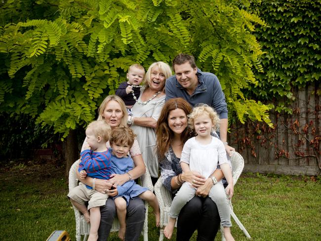 Jeanette Moss (back) with her family.