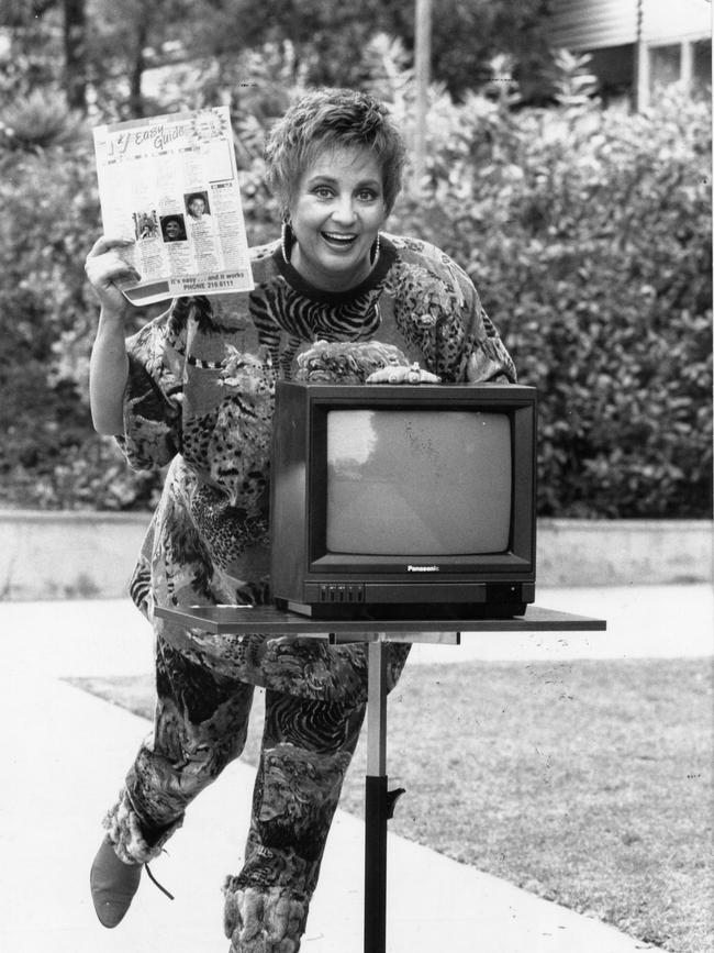 1990: Wills with a small Panasonic television set and the TV Easy Guide from 