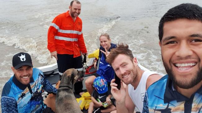 John Asiata, Antonio Winterstein and Gavin Cooper out helping in the floods.