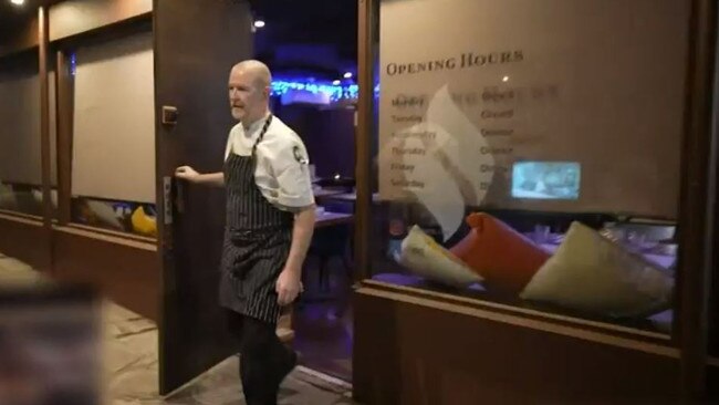 The celebrity chef approached the protesters who were blasting audio of dying pigs outside his busy restaurant. Picture: 9 News