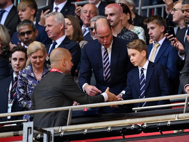 Prince George shakes hands with Pep Guardiola, manager of Manchester City, Picture: Getty Images