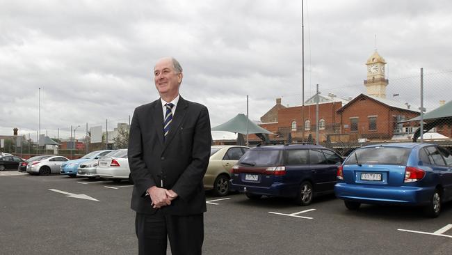 Throwback to the early beginnings of the now opened Richmond High School, replacing a co-ed school closed by the Kennett Government in 1992. Richard Wynne stands in front of a former tech site which will now the sports complex. Picture: Richard Serong