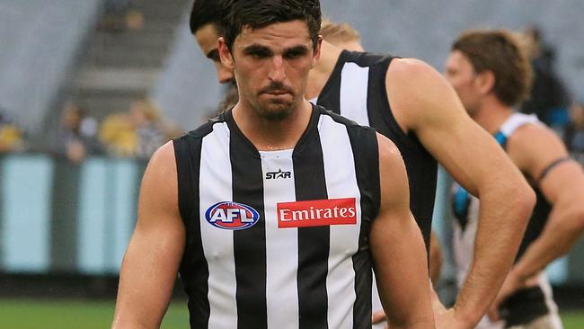 AFL Round 11: Collingwood v Port Adelaide Scott Pendlebury leads the pies off the ground Picture: Wayne Ludbey