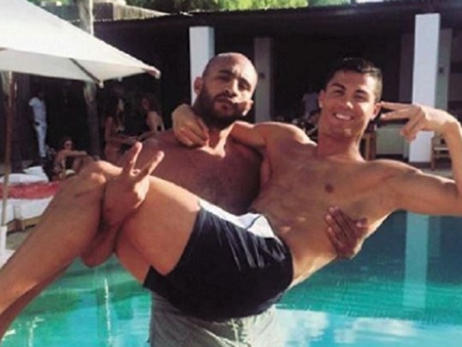 Close ... Cristiano Ronaldo and friend Badr Hari. Picture: Supplied