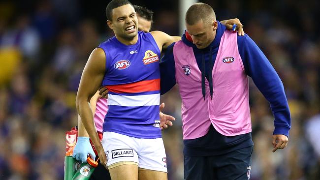 Jason Johannisen comes off with an injured hamstring.